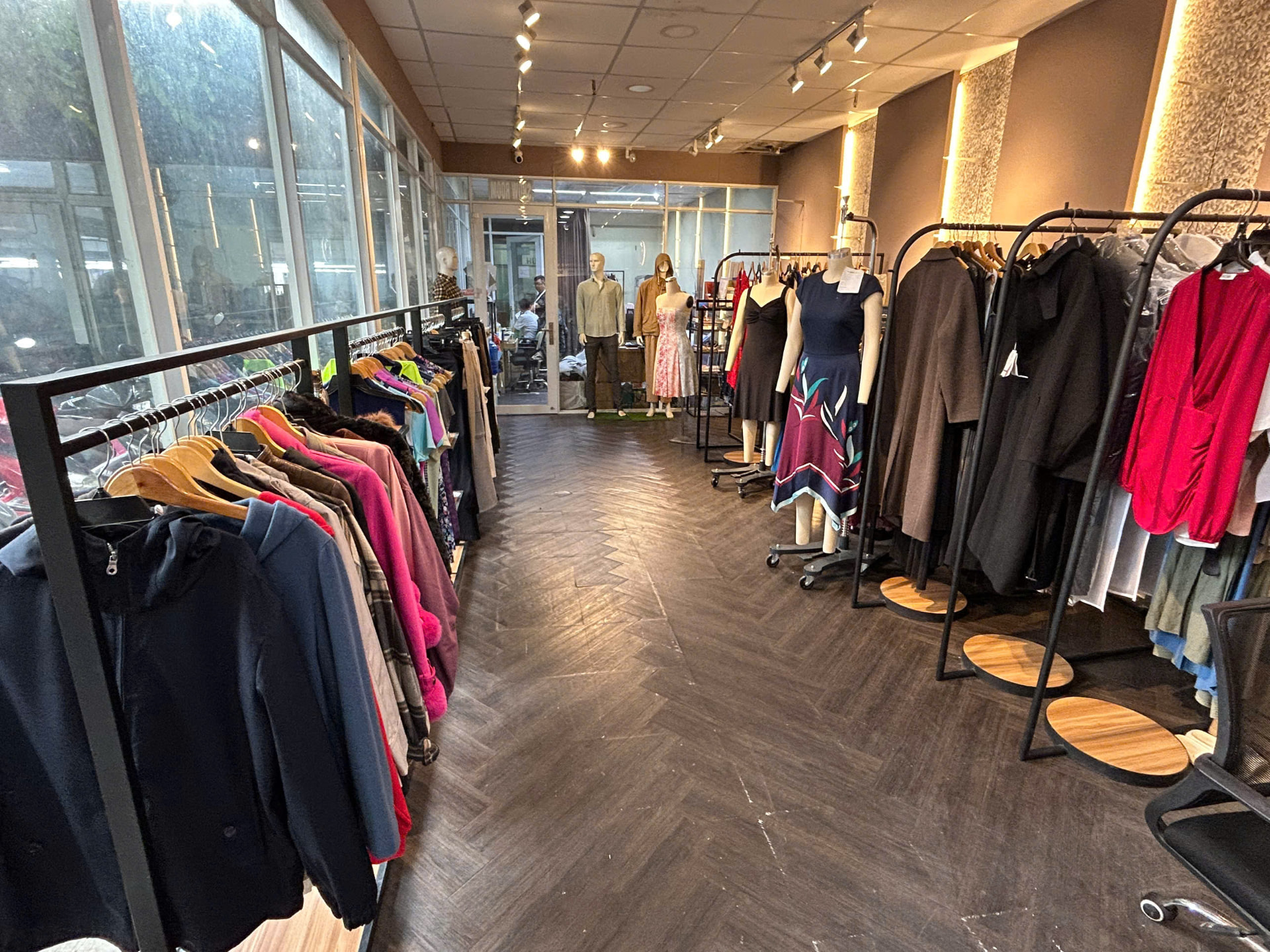 Vietex showroom with garment racks